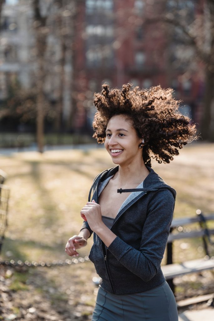 woman jogging on the street